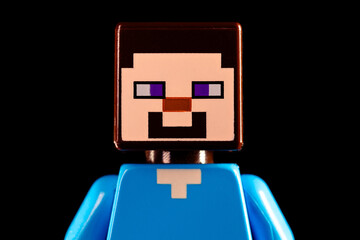 Obraz premium Face of LEGO Minecraft Steve on a black background