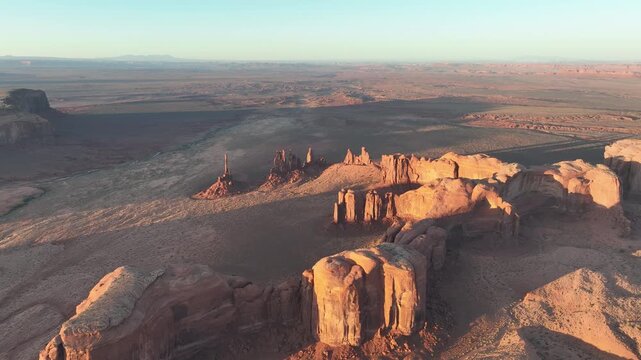 Cinematic aerial video of Monument valley during golden hour, in Arizona, USA