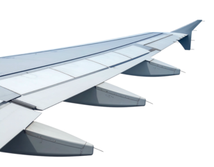Close-up of a large airplane wing, showing detailed paneling, flaps, and ailerons against a black background