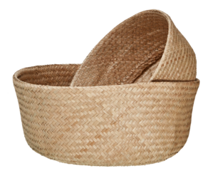 Two stacked baskets made from dried natural fibers cut out isolated transparent background