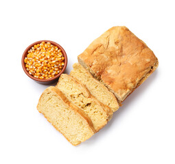 Freshly baked cut cornbread and seeds isolated on white, top view
