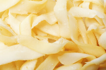 Tasty dried shredded squid as background, top view