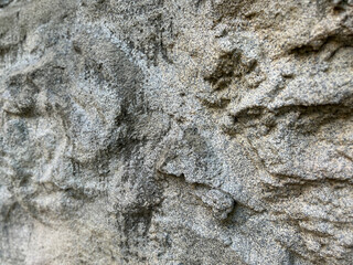 Close up of a rough grey stone texture background