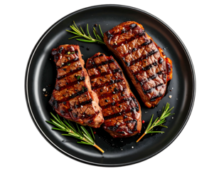 Three grilled steaks, seasoned, arranged on a dark plate with fresh rosemary sprigs.  Juicy, well-done, char-grilled marks visible. Overhead shot