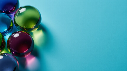 Neon glass orbs stacked along the left edge on bright teal. Clean hero layout with wide right copy space for web headers and social posts.