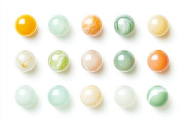 Colorful marbles on white background for kids and playful designs