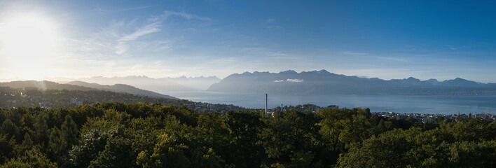 large panorama in Switzerland from Lake Geneva in Lausanne with the Alps in the background