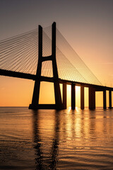 Sunrise Over Vasco da Gama Bridge Spanning the Tagus River in Lisbon, Portugal