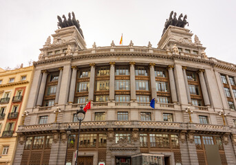 Fototapeta premium Building of Banco Bilbao Vizcaya Argentaria bank on Alcala street, Madrid, Spain