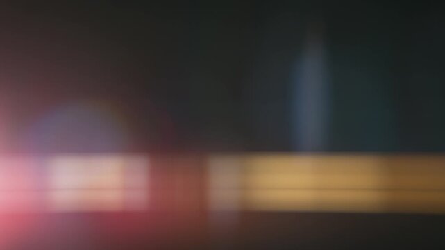 Real Shooted Anamorphic Lens Flare Transition on Black Background in Super Slow Motion.