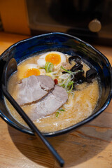 miso ramen with egg, pork and black fungus 