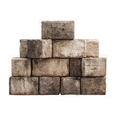 A small, tiered stack of weathered, light-brown rectangular stones, possibly building blocks or a miniature wall