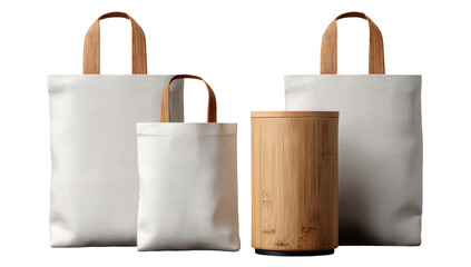 Three white canvas tote bags of varying sizes, with light-brown wooden handles, alongside a cylindrical bamboo container