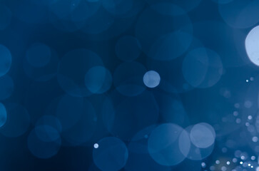 Abstract Blue bokeh defocus glitter blur background.