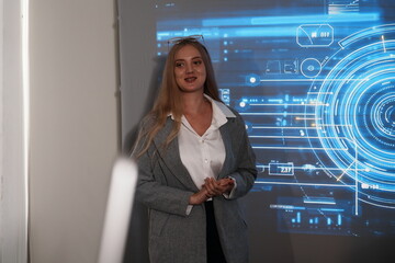 female employee standing in front of a conference room is explaining data presentation technology strategy AI to develop and expand business. Business concept of technology development.
