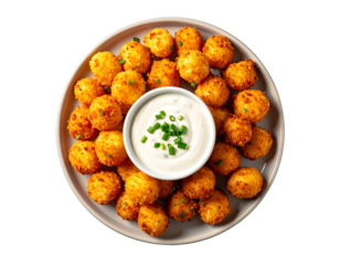 Crispy golden-brown potato balls arranged on a plate, encircled by a small bowl of creamy white dipping sauce garnished with green onions