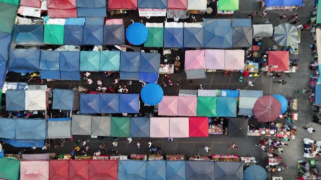 4K Aerial view of flea market with colorful tents