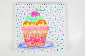 Colorful drawing of a cupcake with cherry on top created during a joyful art session at home