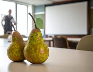 Pears on a table in a conference room