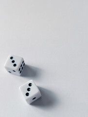 Two dice showing double three in the bottom right corner with copy space