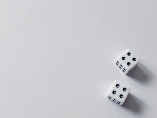 Two dice showing double four in the bottom right corner with copy space