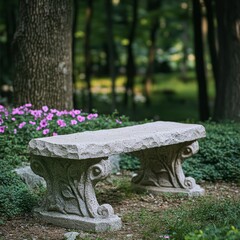 Naklejka premium Stone bench with a flower garden in the background. The bench is empty and the flowers are pink