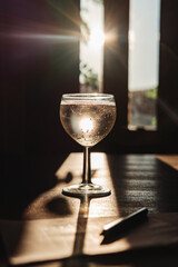 Glass of wine in the evening sun.