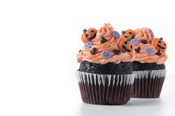 Halloween cupcakes with Halloween sprinkles isolated on white background. Copy space