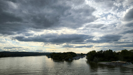 landscape by the Danube river in Novi Sad in autumn, with stormy clouds
