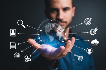 Man holding globe hologram business data global network connection technology concept image hundred char