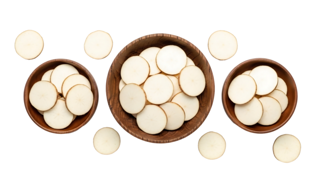 Wooden bowls filled with round slices of white root vegetable
