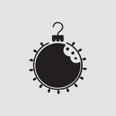 Fototapeta premium Black Silhouette of a Bitten Christmas Ornament with Garland Detail white