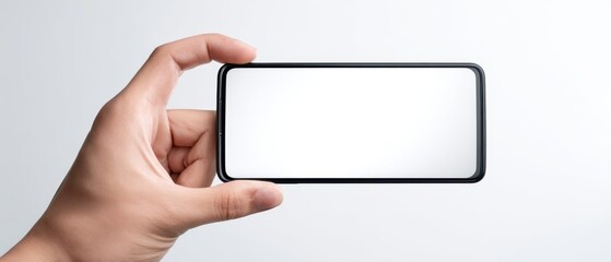 The Smartphone Held Horizontally with Blank Screen for Digital Mockup
