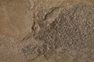 This detailed view of an old stone wall highlights its unique textures and patterns, making it suitable for architecture, construction, and design, showcasing its rich history