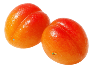 A round metal tray of fish pelmeni, paired with a small cup of white vinegar and a sprinkle of pepper.