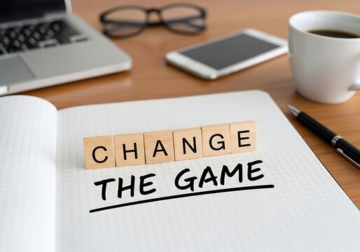 Change the Game Innovative Business Strategy Concept with Laptop and Coffee Cup.