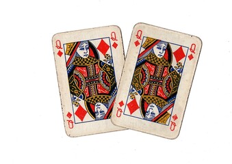 A pair of  identical vintage playing cards isolated on a white background.