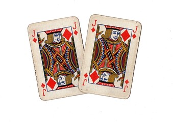 A pair of  identical vintage playing cards isolated on a white background.