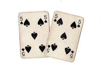 A pair of  identical vintage playing cards isolated on a white background.