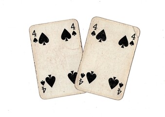A pair of  identical vintage playing cards isolated on a white background.