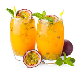 Tasty passion fruit drink with mint in glasses and fresh fruits isolated on white