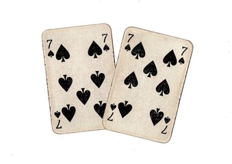 A pair of  identical vintage playing cards isolated on a white background.