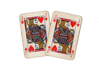 A pair of  identical vintage playing cards isolated on a white background.