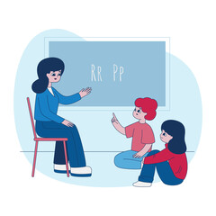 Speech therapist teaches children to pronounce letters