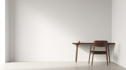 Minimalist room with light walls and wooden floor, simple desk in corner, brown curved chair, small white cup on desk,