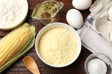 Different ingredients for corn bread on wooden table, flat lay