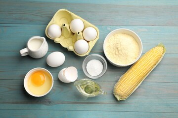 Cornbread preparation. Different ingredients on light blue wooden table, flat lay