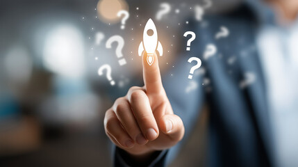 Businessman touching touch screen. white rocket and question marks silhouette. Blurred office background
