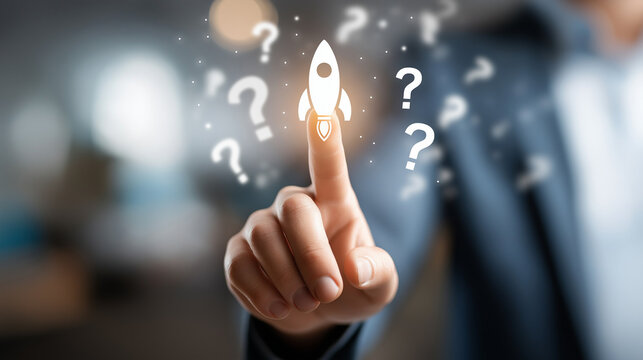 Businessman touching touch screen. white rocket and question marks silhouette. Blurred office background