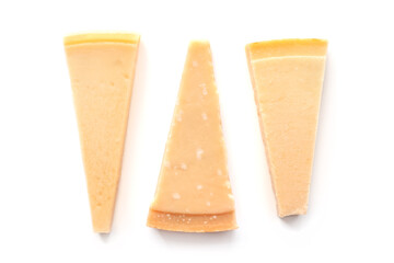Parmesan cheese wedges, overhead flat lay shot, isolated on a white background, an assortment